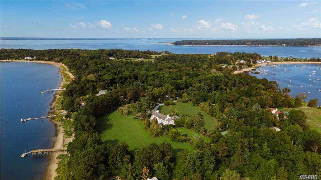 Introducing Westaways Magnificent 10 acre waterfront gated estate complete with 487 feet of direct beachfront and new 100 ft dock.