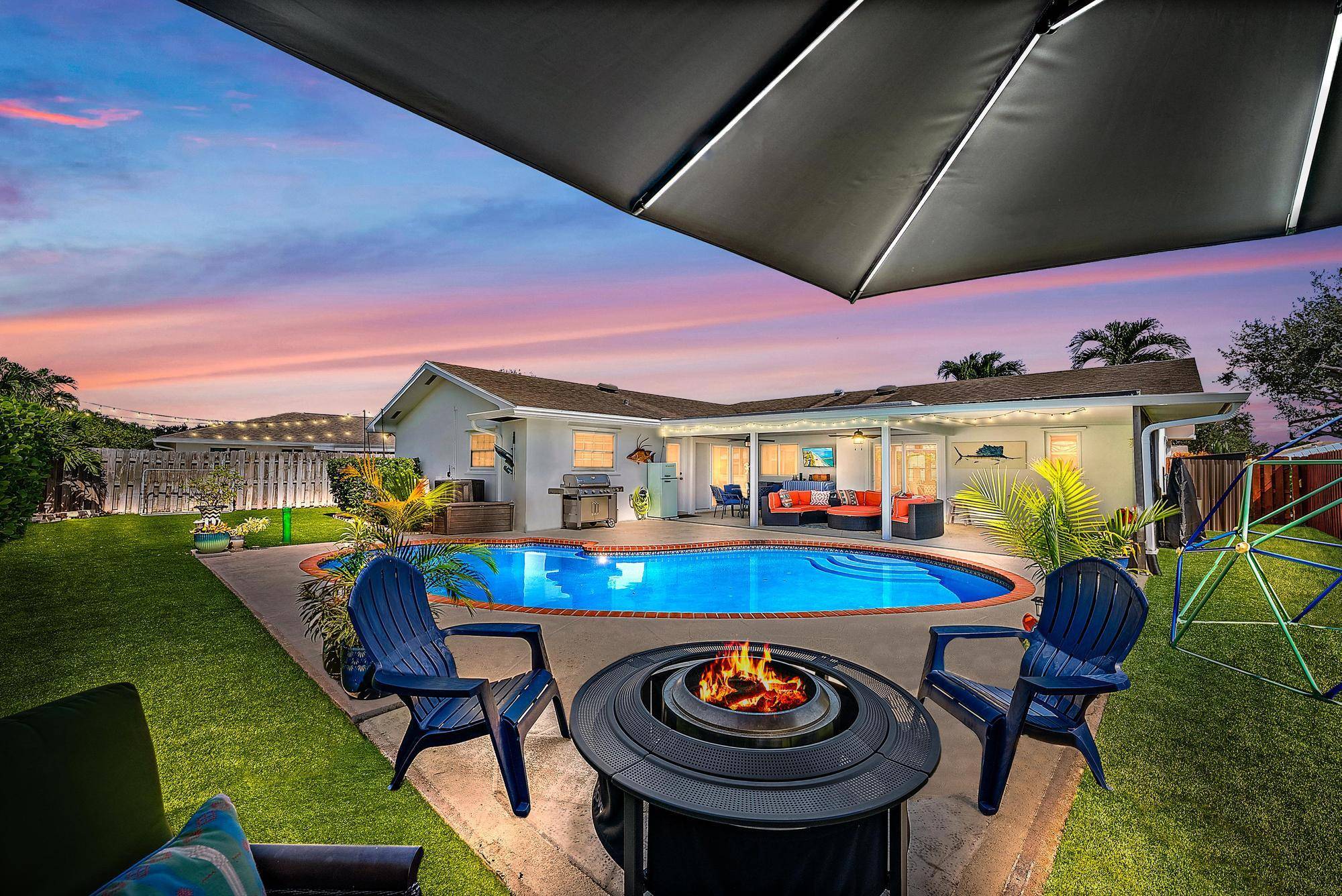 Experience the ideal blend of Florida elegance and Serena Lily inspired design in this light airy Palm Beach Gardens CBS home.