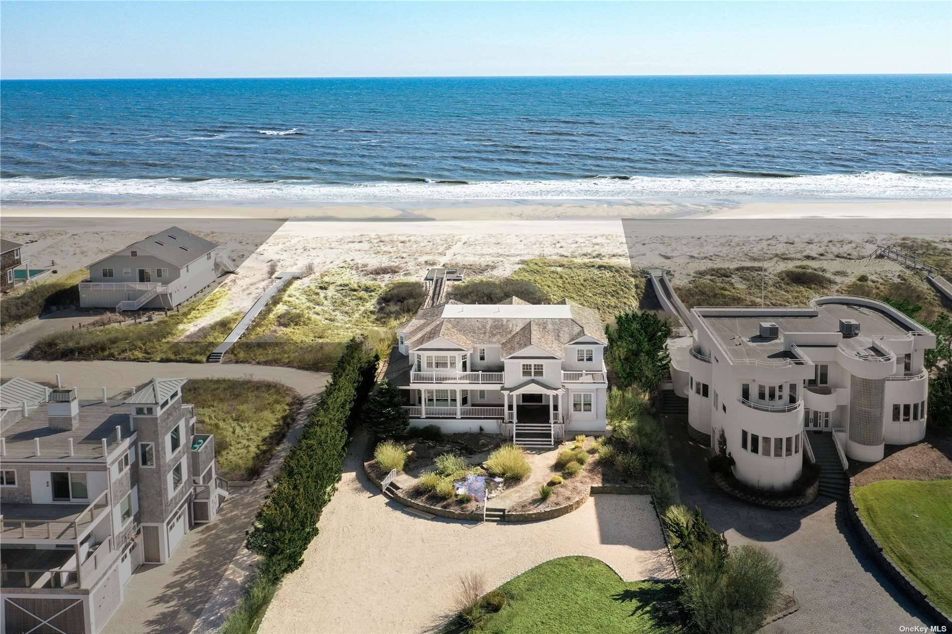 Affording the best of Oceanfront living on a shy 2 acre parcel, commanding a beautiful stretch of white sugar sand beach and surrounded by unparalleled panoramic sunrise and sunset views ...