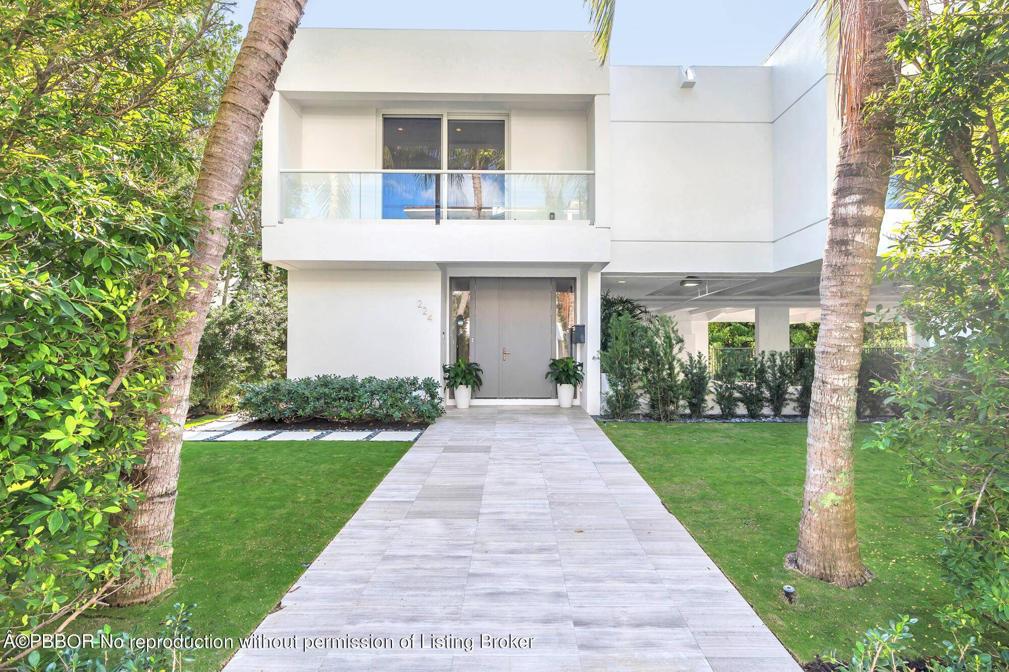 Nestled in the heart of town, this exquisite modern residence spans over 6, 428 square feet, boasting four bedrooms and four and a half baths.