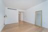 Spare room featuring light wood-style flooring