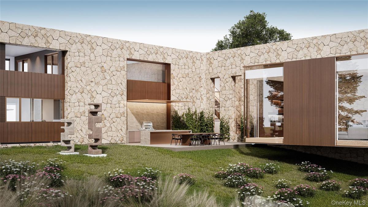 Covered outdoor kitchen with adjacent dining