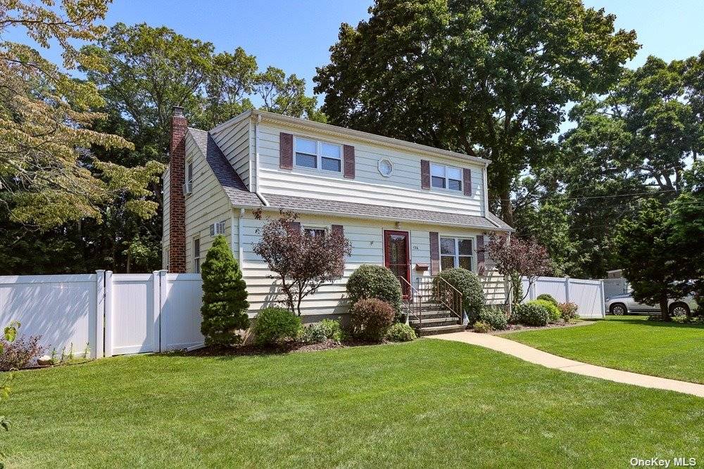Pride of Ownership Through Out This Beautifully Maintained Expanded Cape.