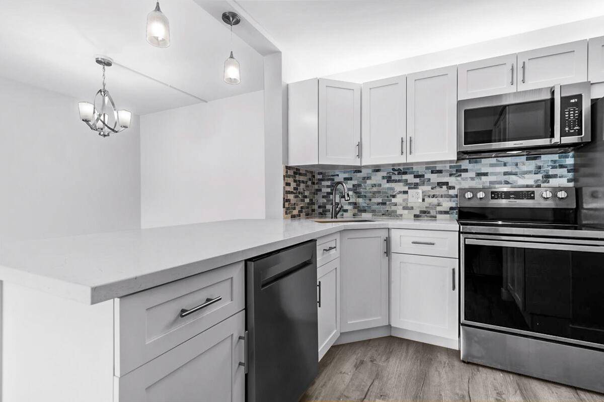 100 FULLY RENOVATED 2 bedroom, 2 bathroom corner unit condo with large walk in closet and large private balcony Open concept kitchen dining family room ; Light and bright fully ...