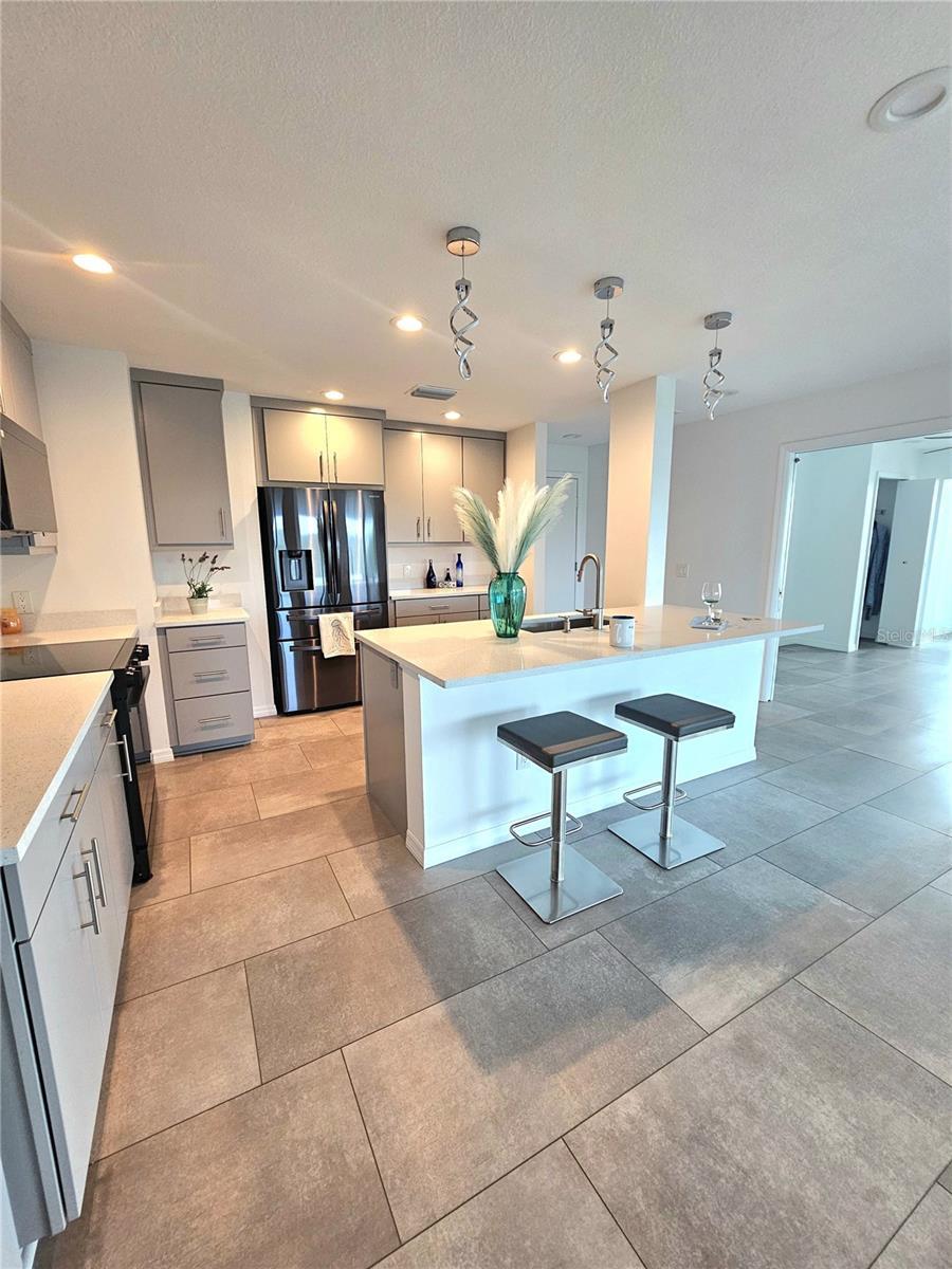 Renovated Chefs Kitchen which Opens to Dining and Living Room