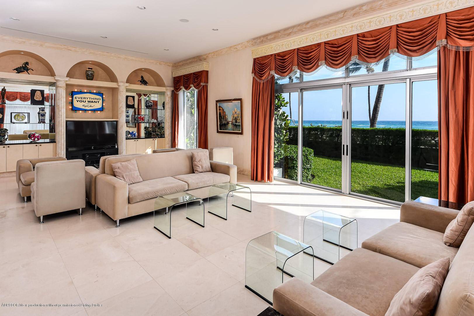 Private and exclusive oceanfront condo with 12 14' ceilings.