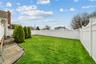 View of fenced backyard