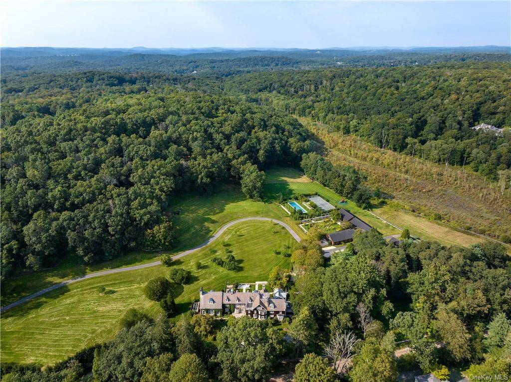 Brook Hollow Farm is a captivating retreat nestled in one of the premier estate sections in the Town of Bedford, New York.
