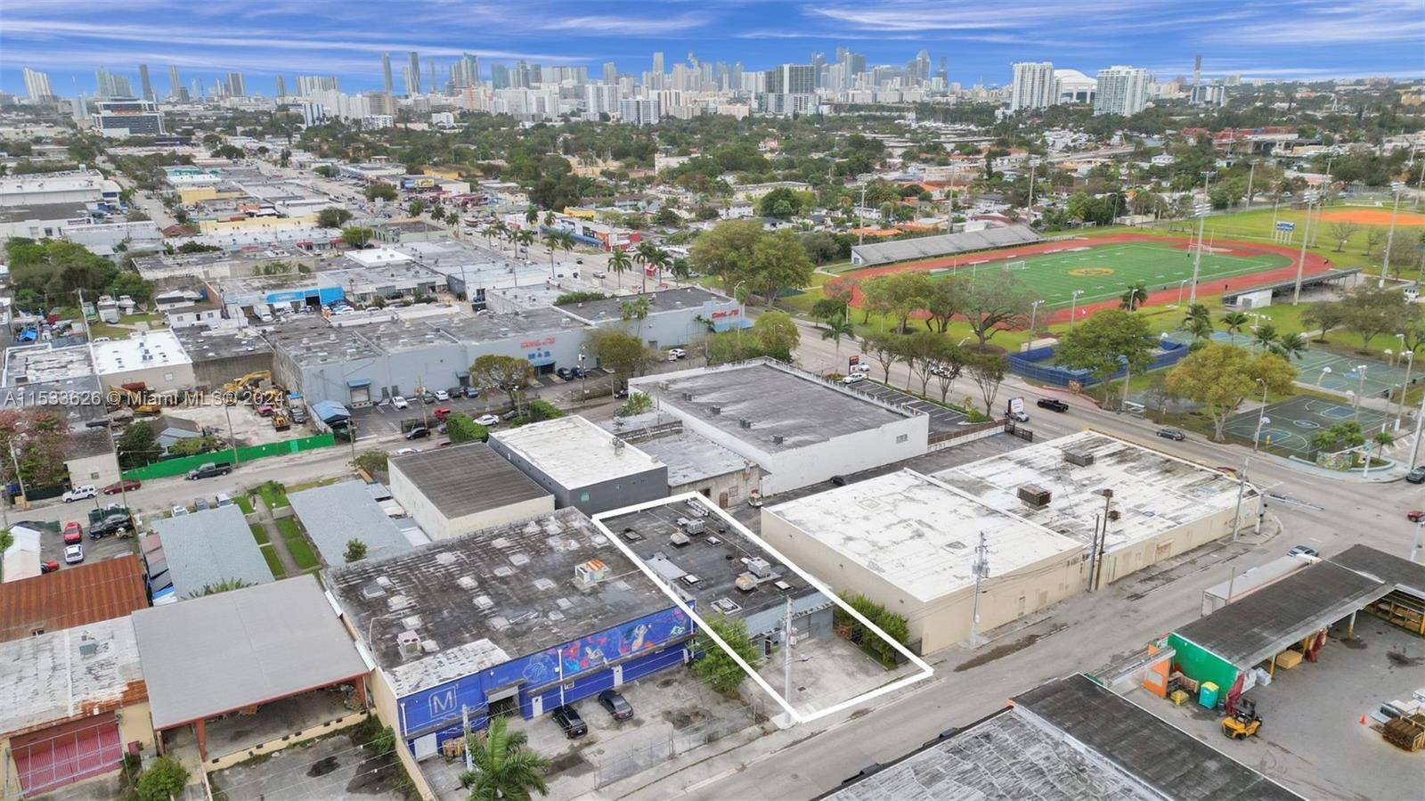 Completely remodeled freestanding warehouse in the Garment District near the Miami River.