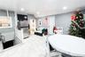 Dining area featuring recessed lighting and light marble finish floors