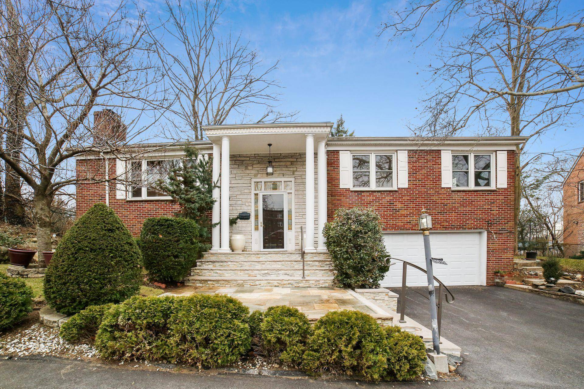 Lovely brick split level one family home in the estate section of Riverdale.