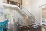 Dramatic Two Story Foyer | Wrought Iron Railing | Marble Foyer | Detailed Millwork