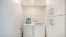 Spacious in unit laundry room with washer and dryer