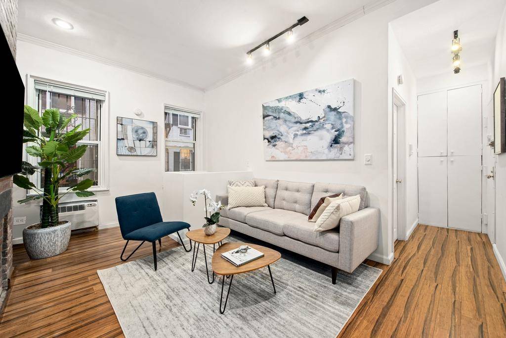 Incredible duplex in the heart of Gramercy has two bedrooms, high ceilings, hardwood floors, high ceilings and large windows.
