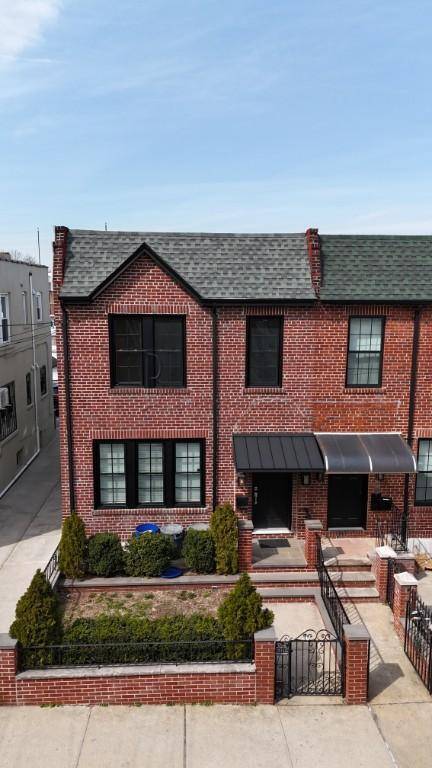 Renovated Two Family home for sale in the heart of Ditmars.