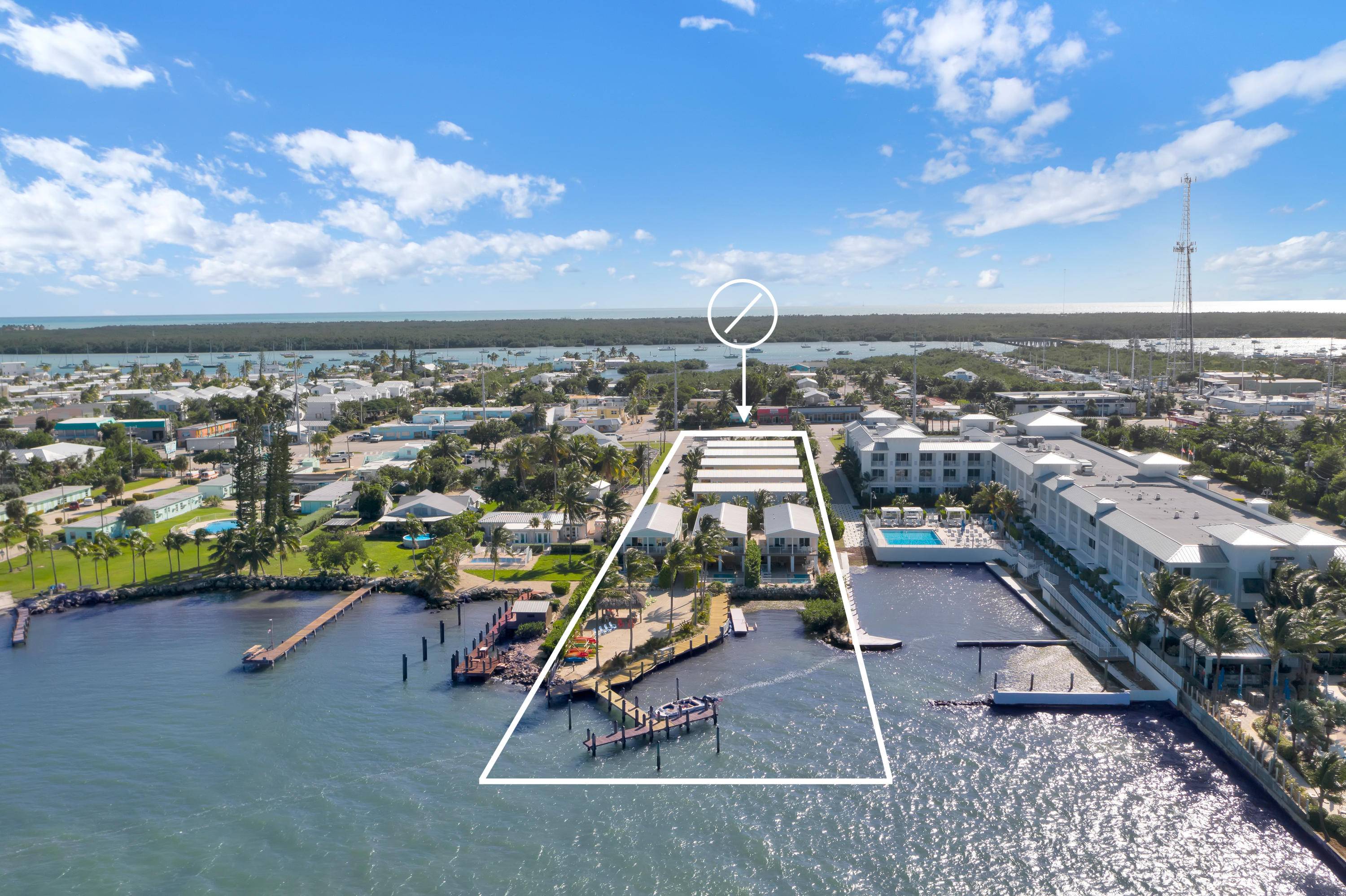 Built in 2018, turnkey waterfront vacation rental development comprised of eight single family houses, each with four bedrooms and three full bathrooms built to current windstorm standards.