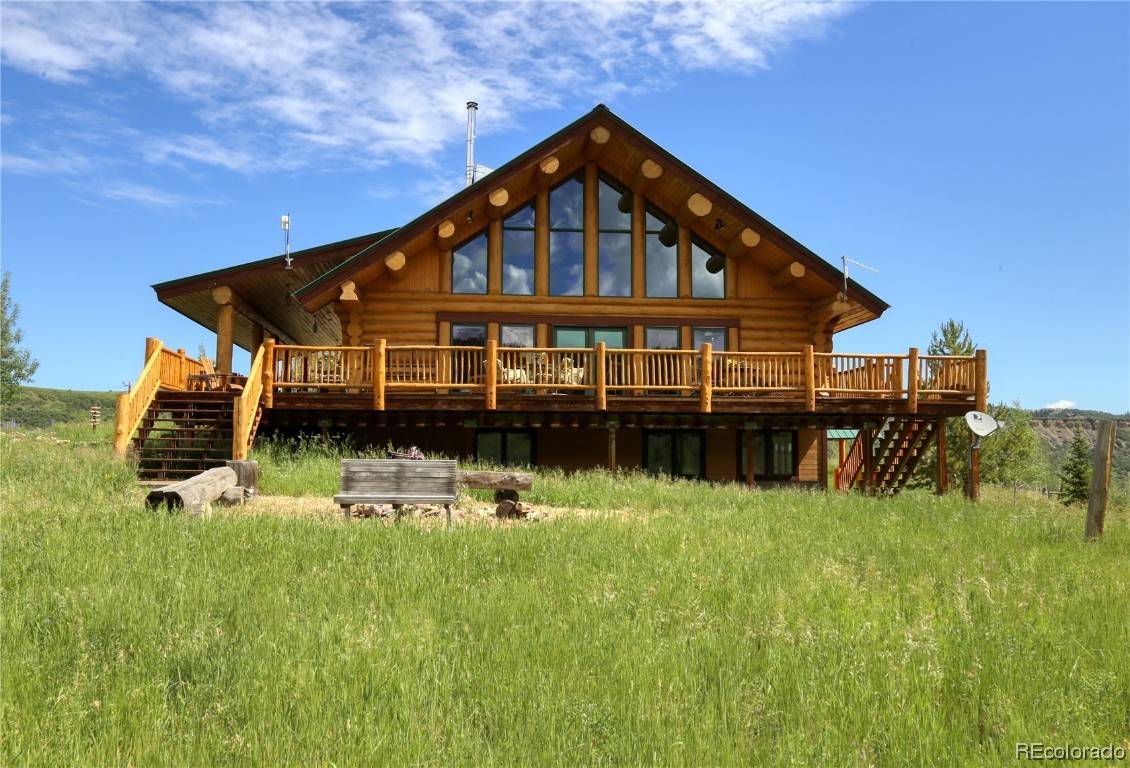 One of a kind country property has panoramic mountain views on 83.