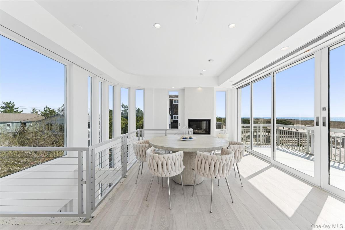 Sunroom featuring a wealth of natural light