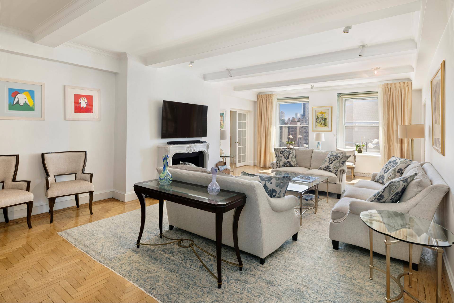 Front corner sprawling Fifth Avenue home Positioned on a high floor, on the prime 5th Avenue museum block, this Central Park facing, exceptionally sunny, dramatic 4 bedroom, plus library, staff ...