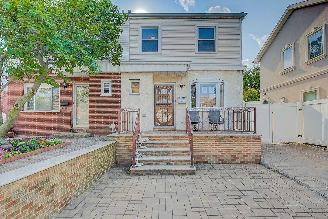 Stunning single family semi detached brick house on a beautiful row house block in highly sought after Astoria Heights.
