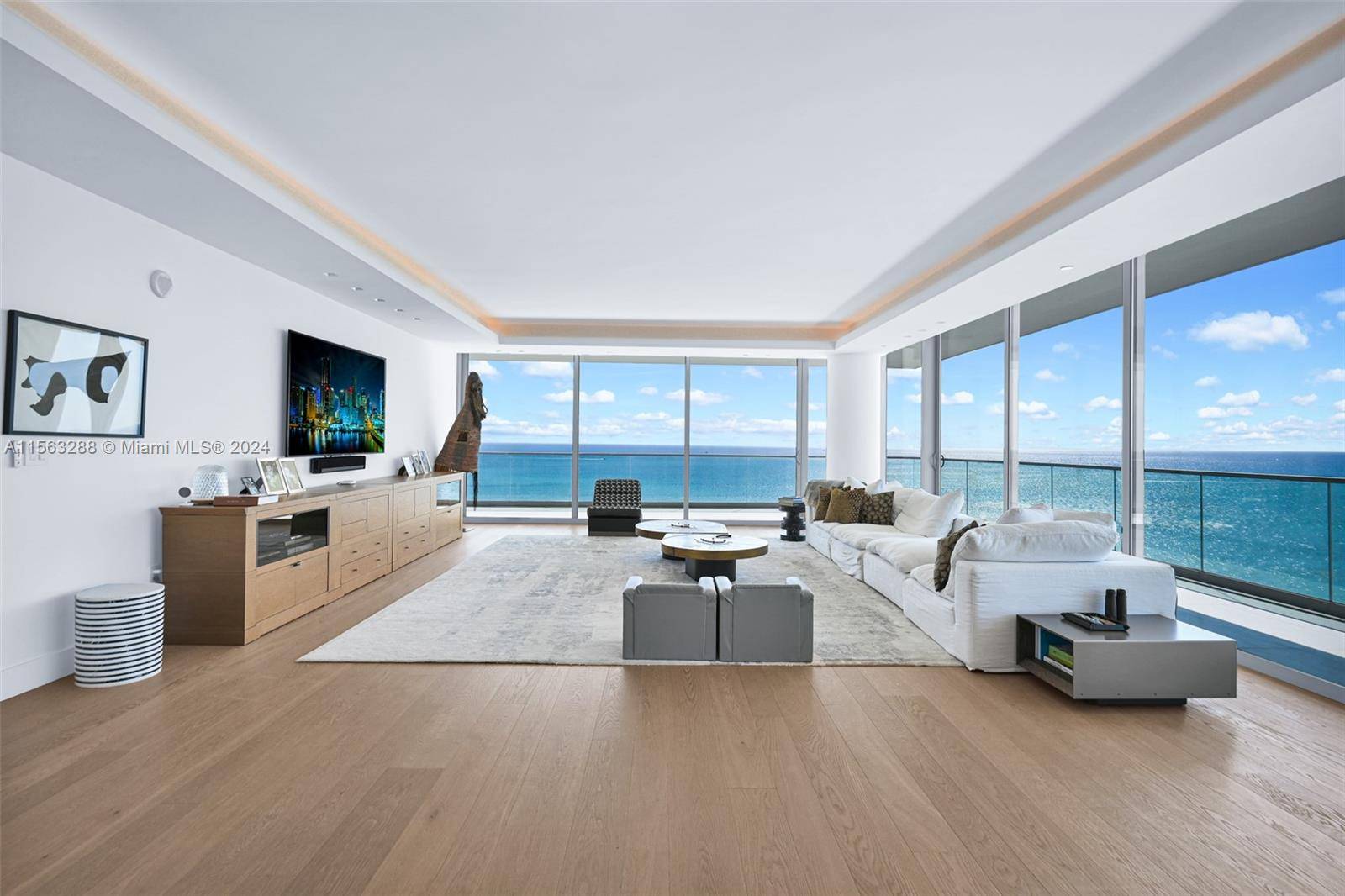 This exceptional high floor oceanfront residence offers unparalleled views of the glistening Atlantic Ocean and iconic Downtown Miami skyline.