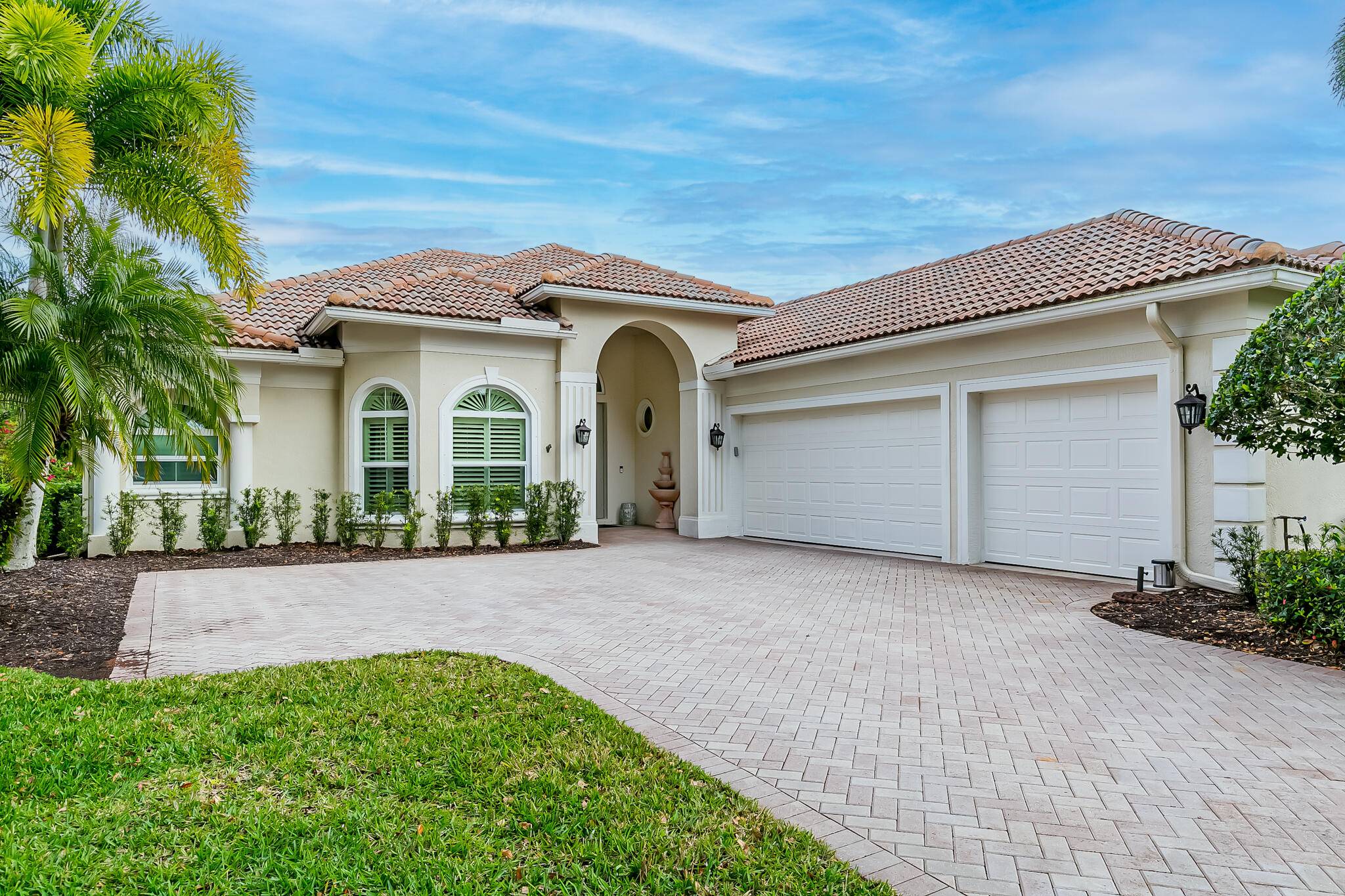 This stunning one owner home is located in the lovely community of Club Side in PGA Village a minute from the front gate.