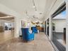 Adjacent to the seating area is a bar area replete with wine fridge and icemaker. Convenient for serving guests without interfering with the meal pre