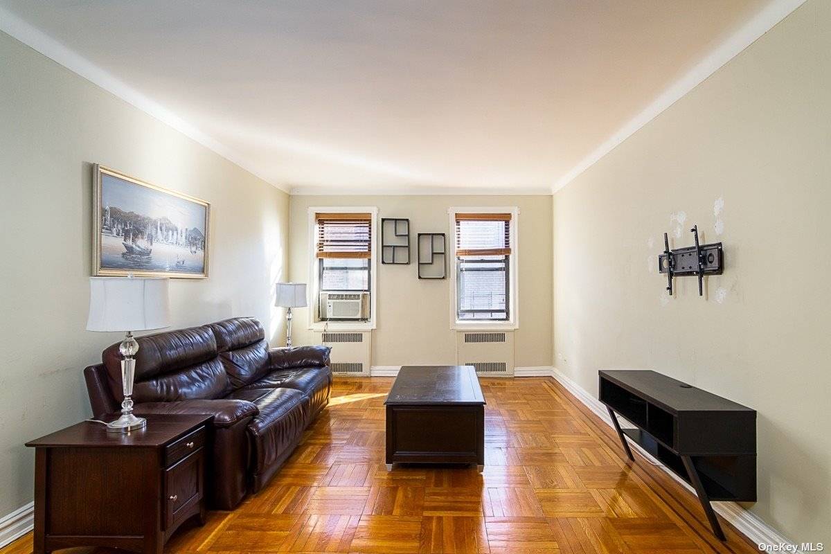 Welcome to this Spacious and Sunlit Top Floor 1 Bedroom Apartment in a Charming Pre War Building Located in the Heart of Rego Park.