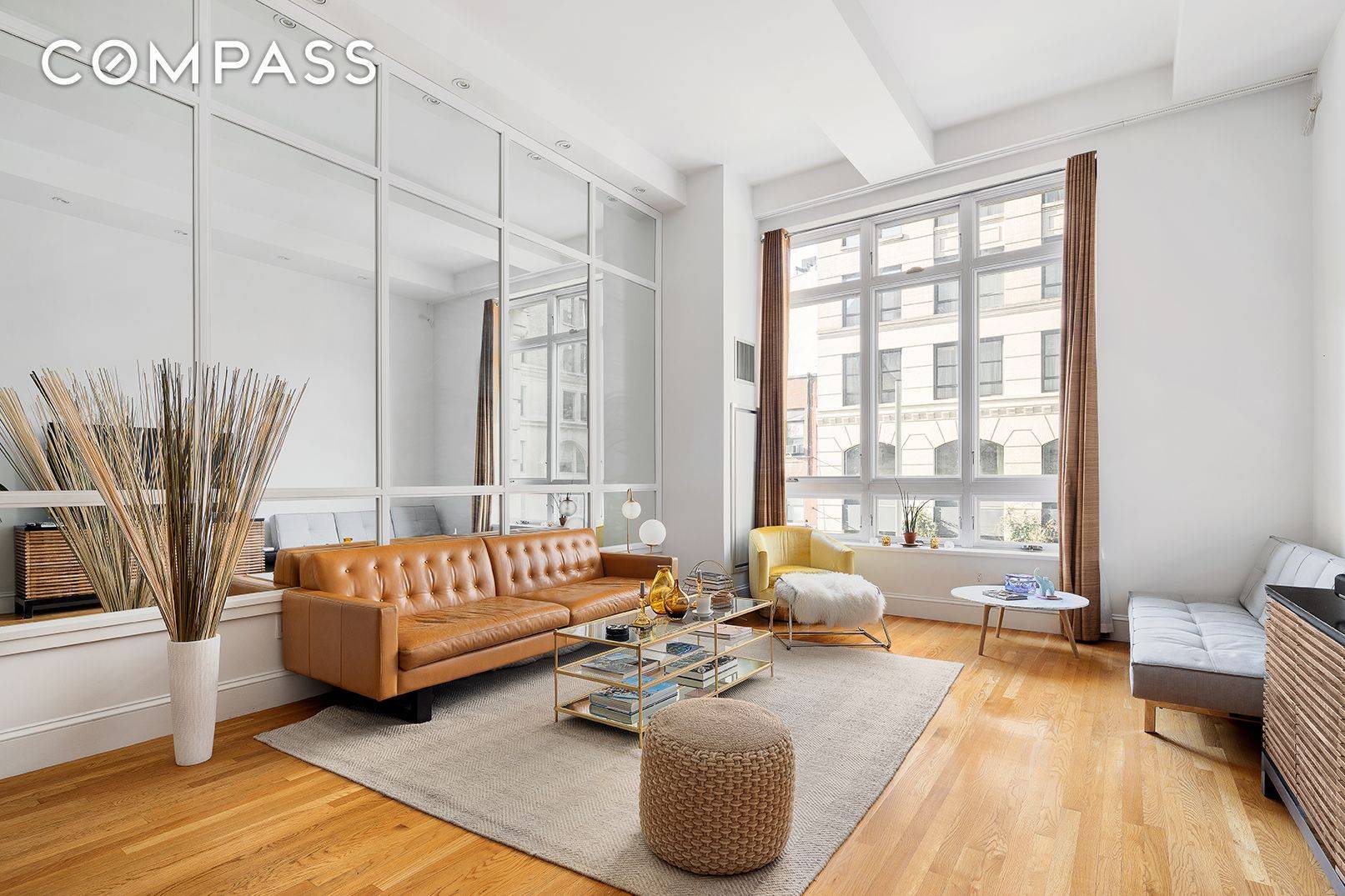 At over 1, 200 square feet, this one bedroom home office loft features soaring 13 foot ceilings, enormous triple paned windows and a suite of high end appliances, all within ...