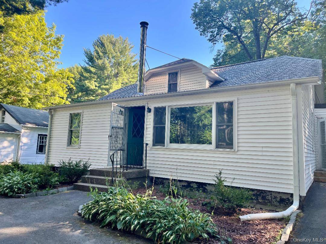 Two charming homes on one beautiful parcel perfect for families, investors, or anyone seeking space and serenity.