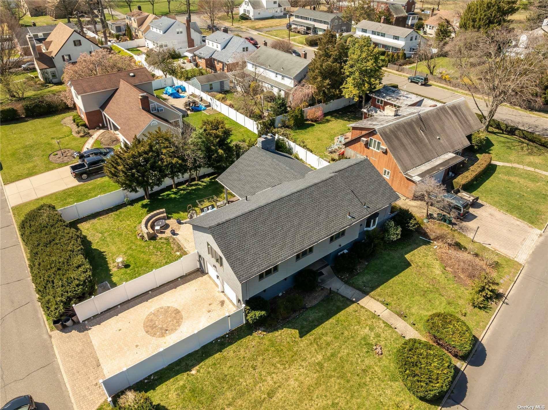 Welcome to 523 Cambridge Avenue, a gem in Westbury, NY.