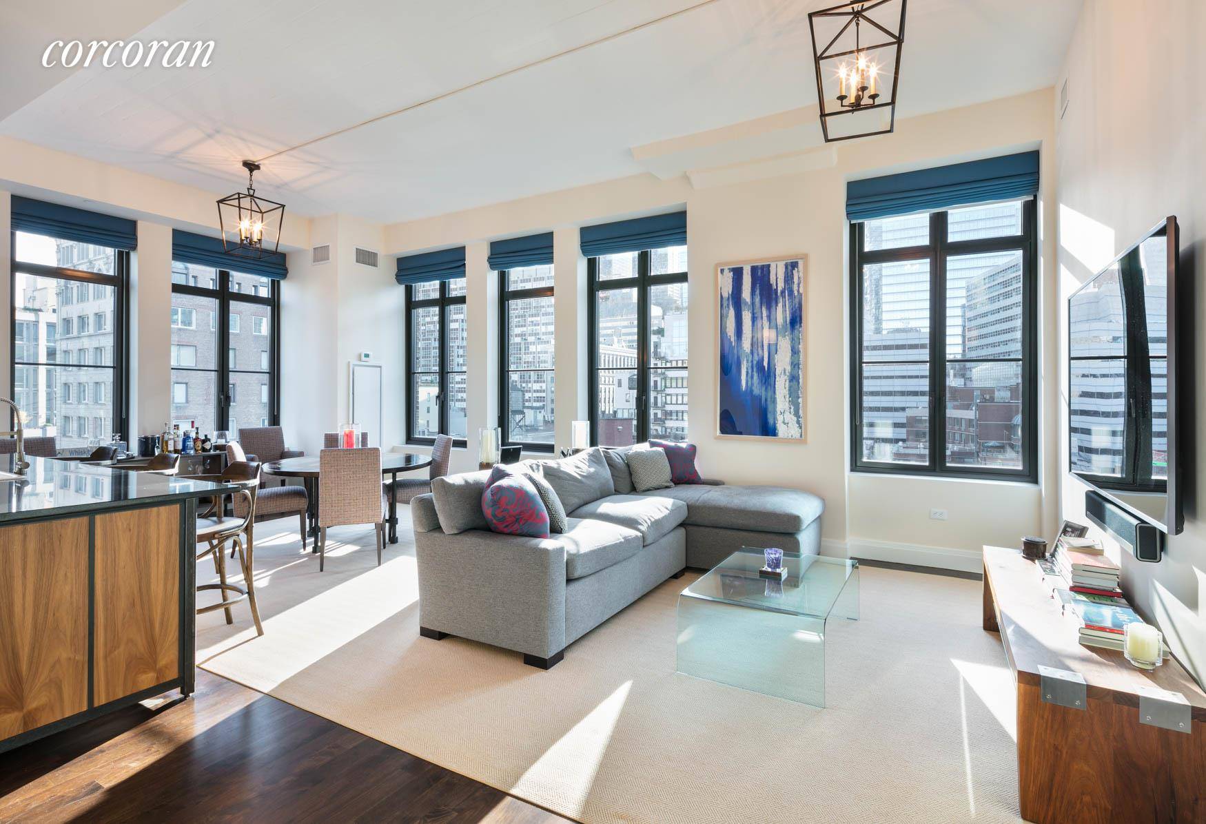 Enjoy sun filled loft living in this flawless showplace featuring three bedrooms, and two and a half bathrooms in a prized, full service Tribeca condominium building.