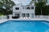 View of swimming pool featuring a fenced in pool, a patio area, outdoor dining area, and fence