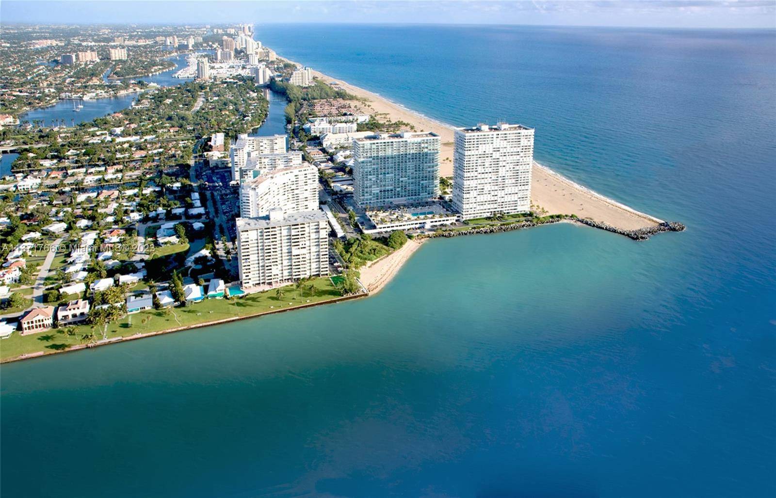 Best value ! Fully renovated and modern designer thru model offers direct inlet and ocean views south to Miami plus ocean and beach views facing north.