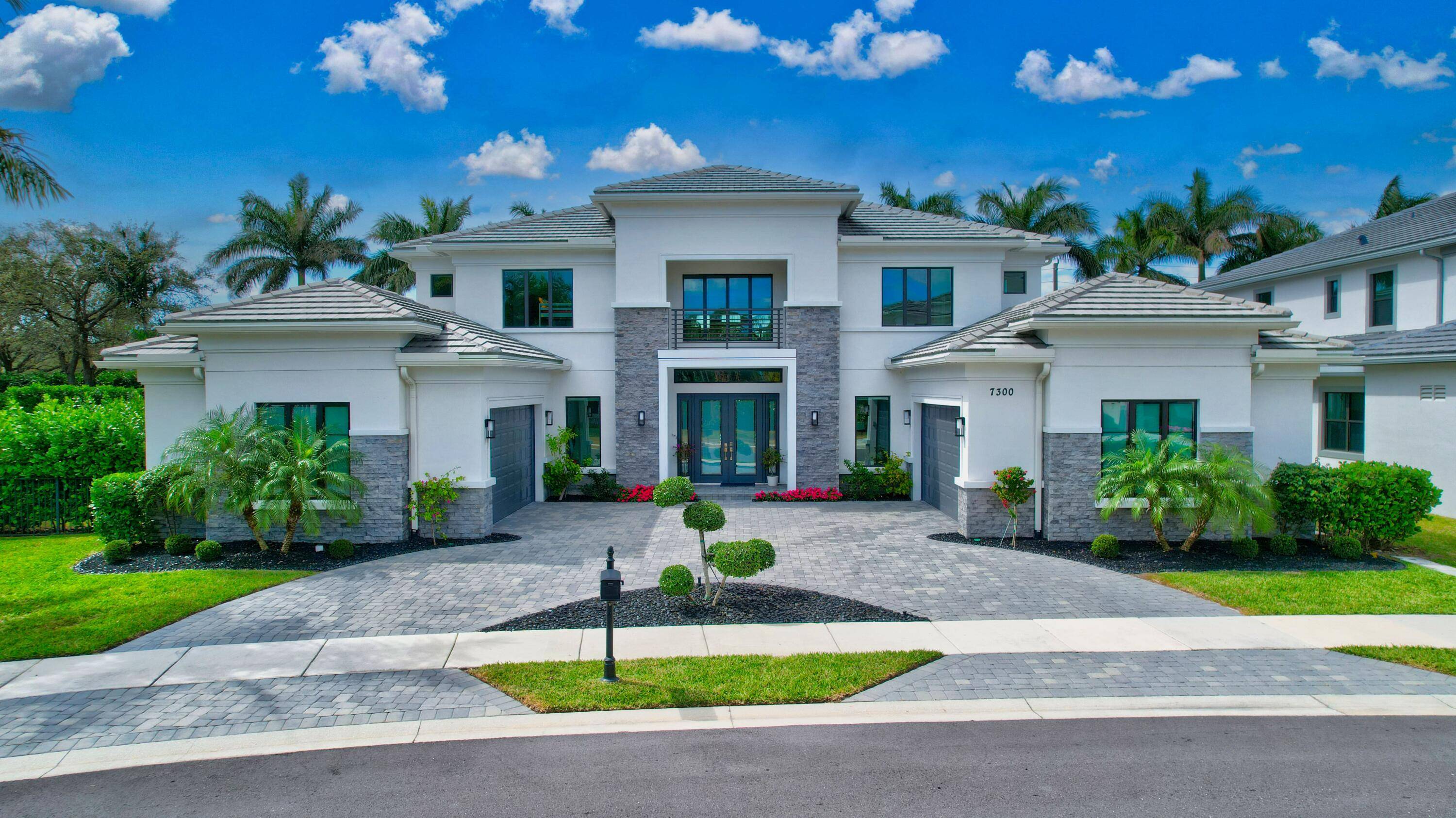 Welcome to a one of kind expanded McIntosh II model located within the highly sought after non membership community of Royal Palm Polo.