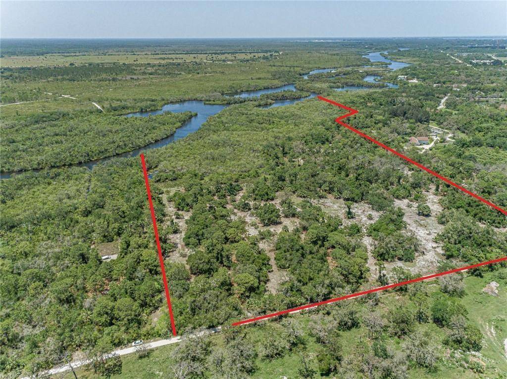 40 ACRES. Discover this one of a kind opportunity to acquire sizable riverfront site like nothing else on the market today in beautiful sought after Indian River County.