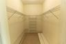 walk-in closet in primary bedroom