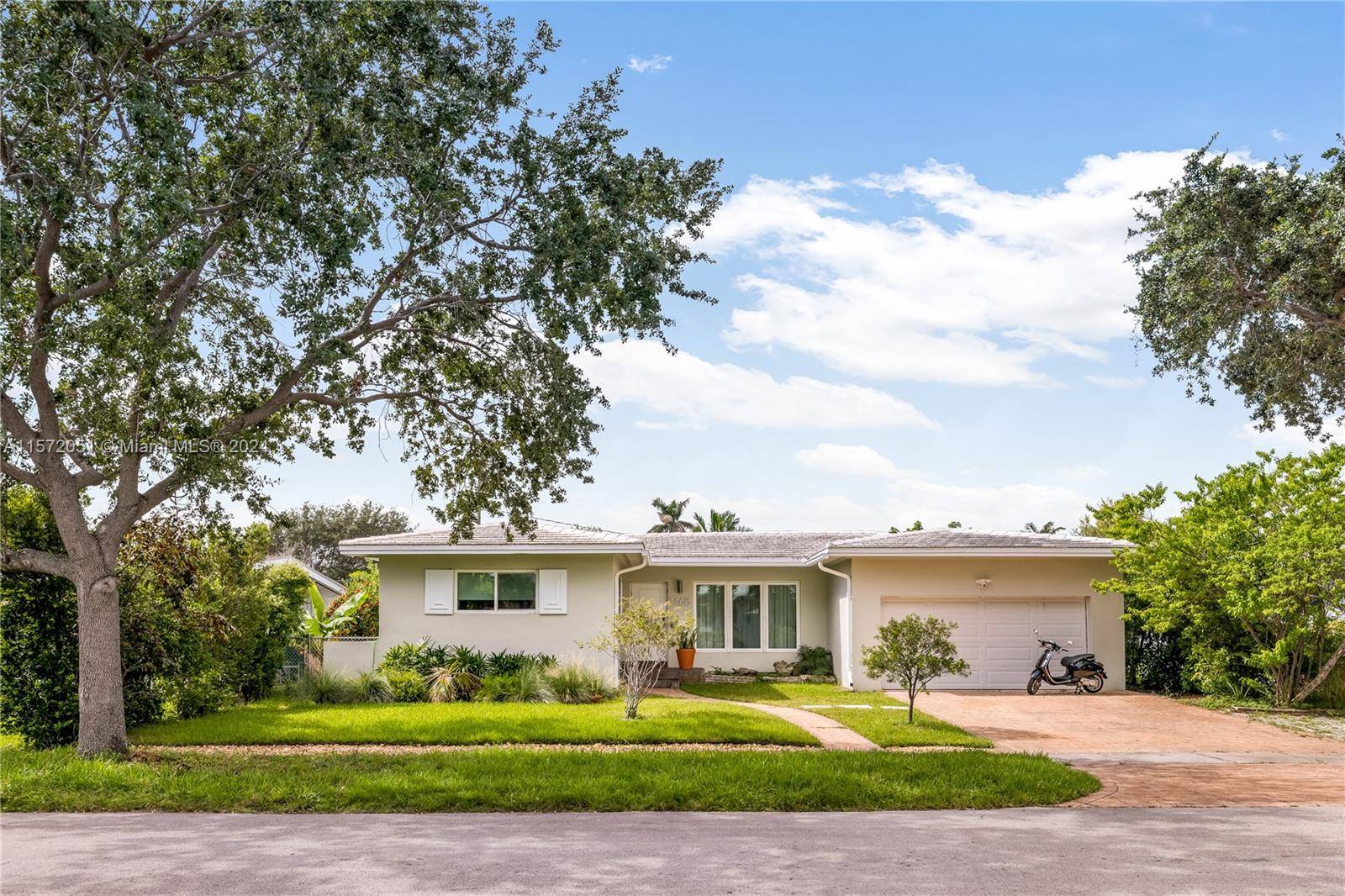 Nestled in the tranquil setting of a quiet dead end street in Miami Shores, this recently renovated 3 beds 2 baths property offers a unique living experience.