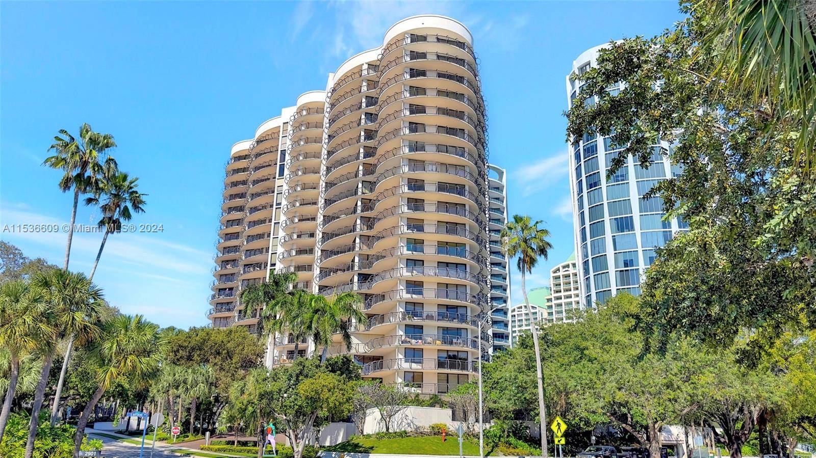 Spectacular Grove Towers spacious 2 bedroom, 2 bath home with plenty of natural light from the floor to ceiling sliding glass doors which open to the beautiful wraparound balconies.