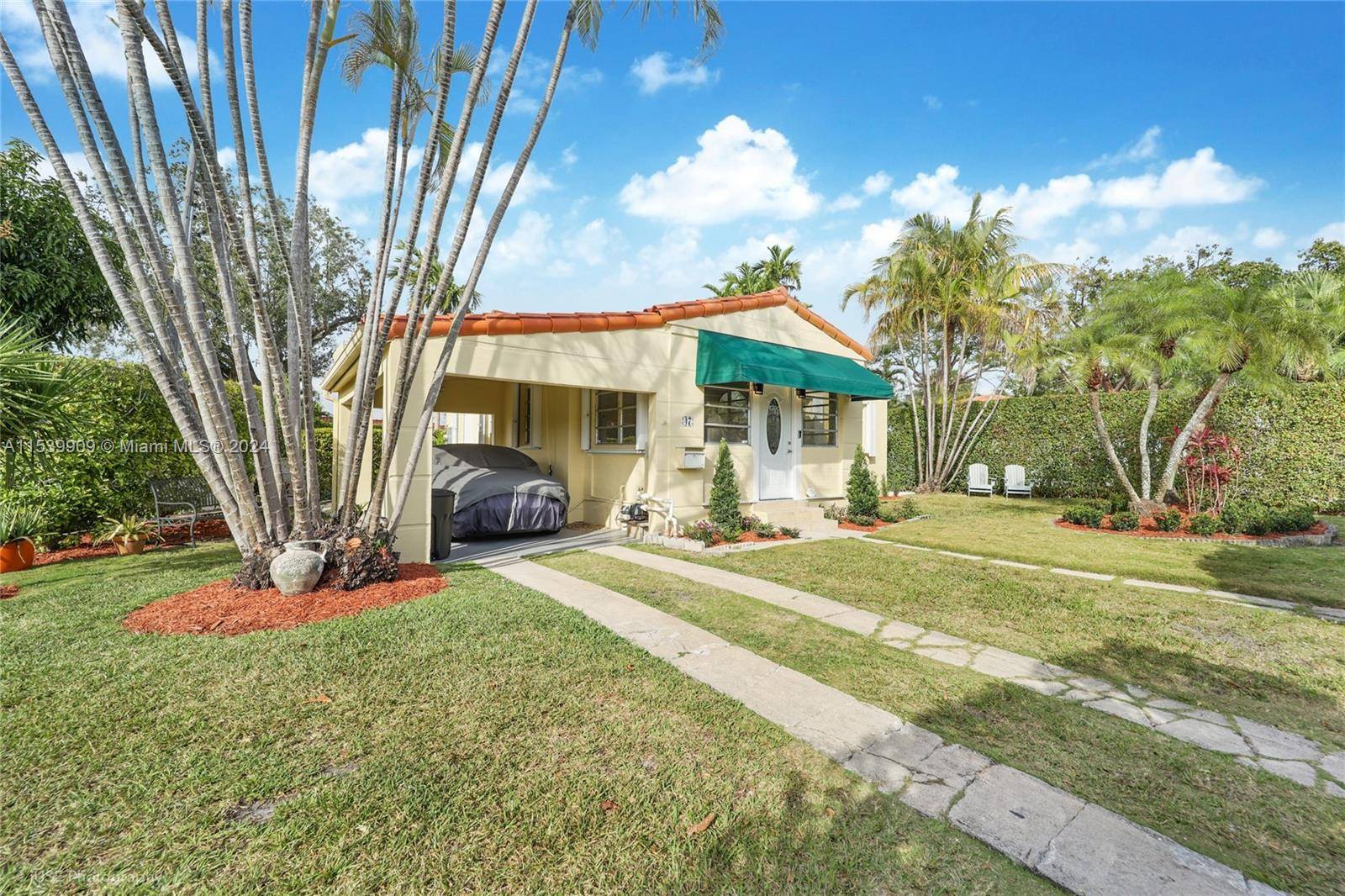 Beautiful one story home with 3 bedrooms and 2 baths, located on a wide street in Coral Gables.