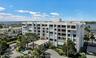 6 Stories w/port cochere