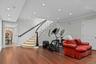 Workout room featuring wood finished floors, crown molding, a chandelier, and recessed lighting