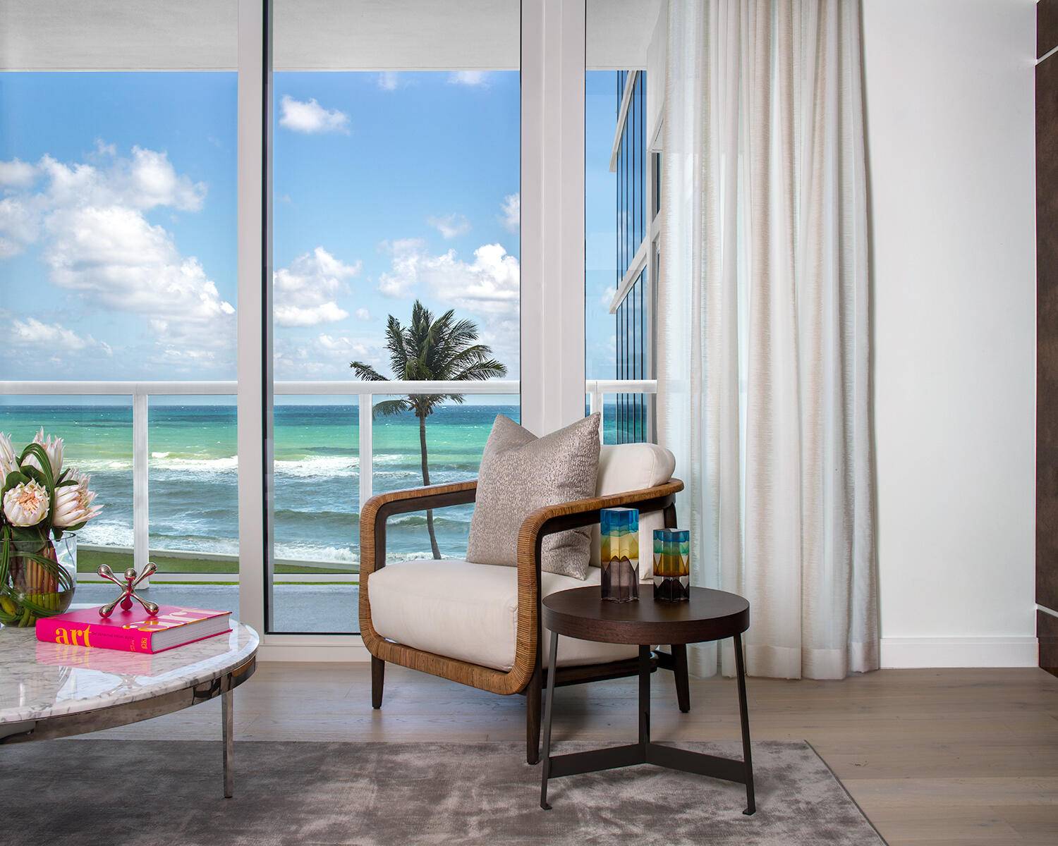 This never before lived in beachfront condo features 3 bedrooms plus separate den 3.
