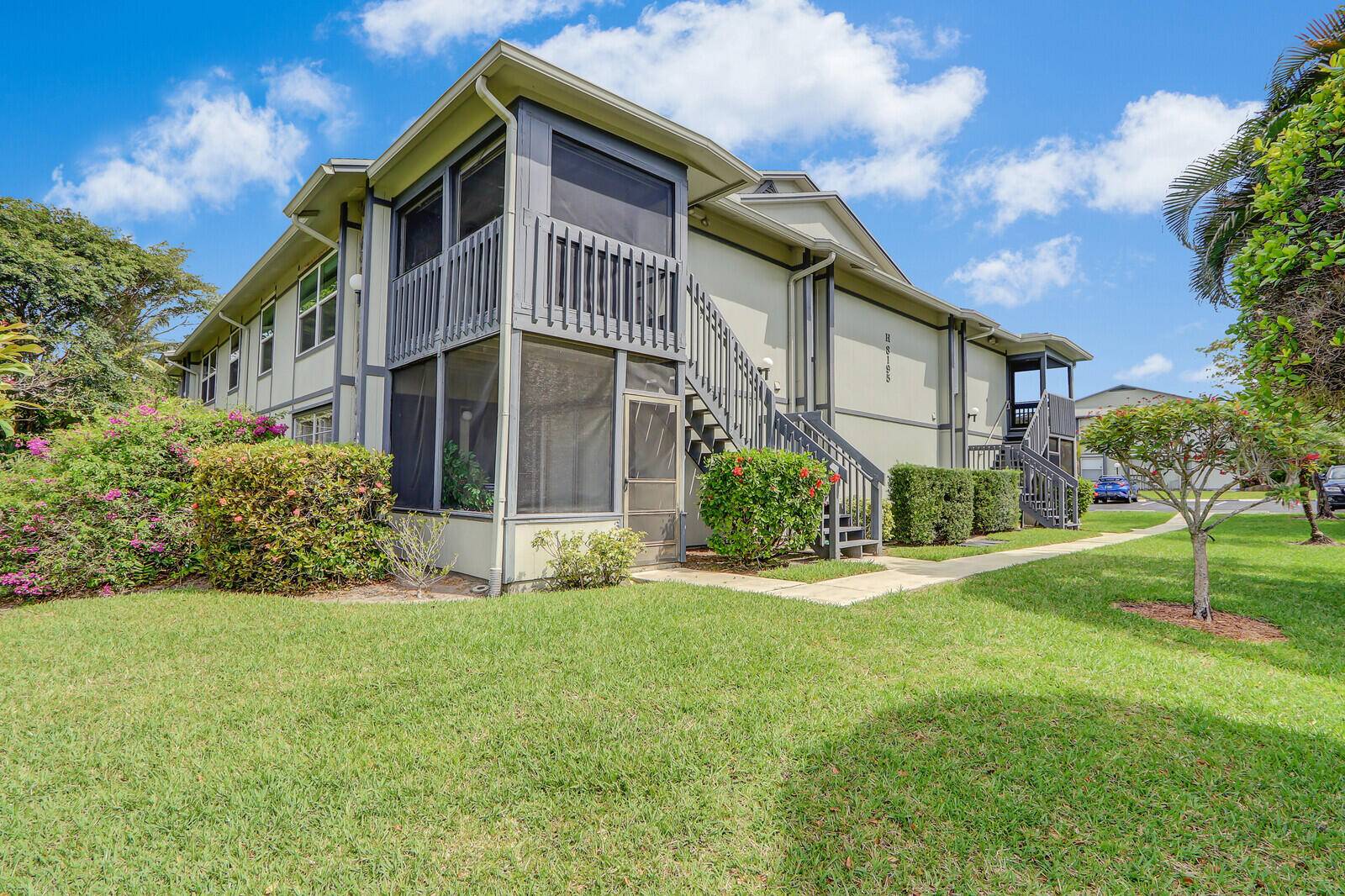 This one of a kind second floor 2 2 unit is a gem nestled in the heart of Hobe Sound.