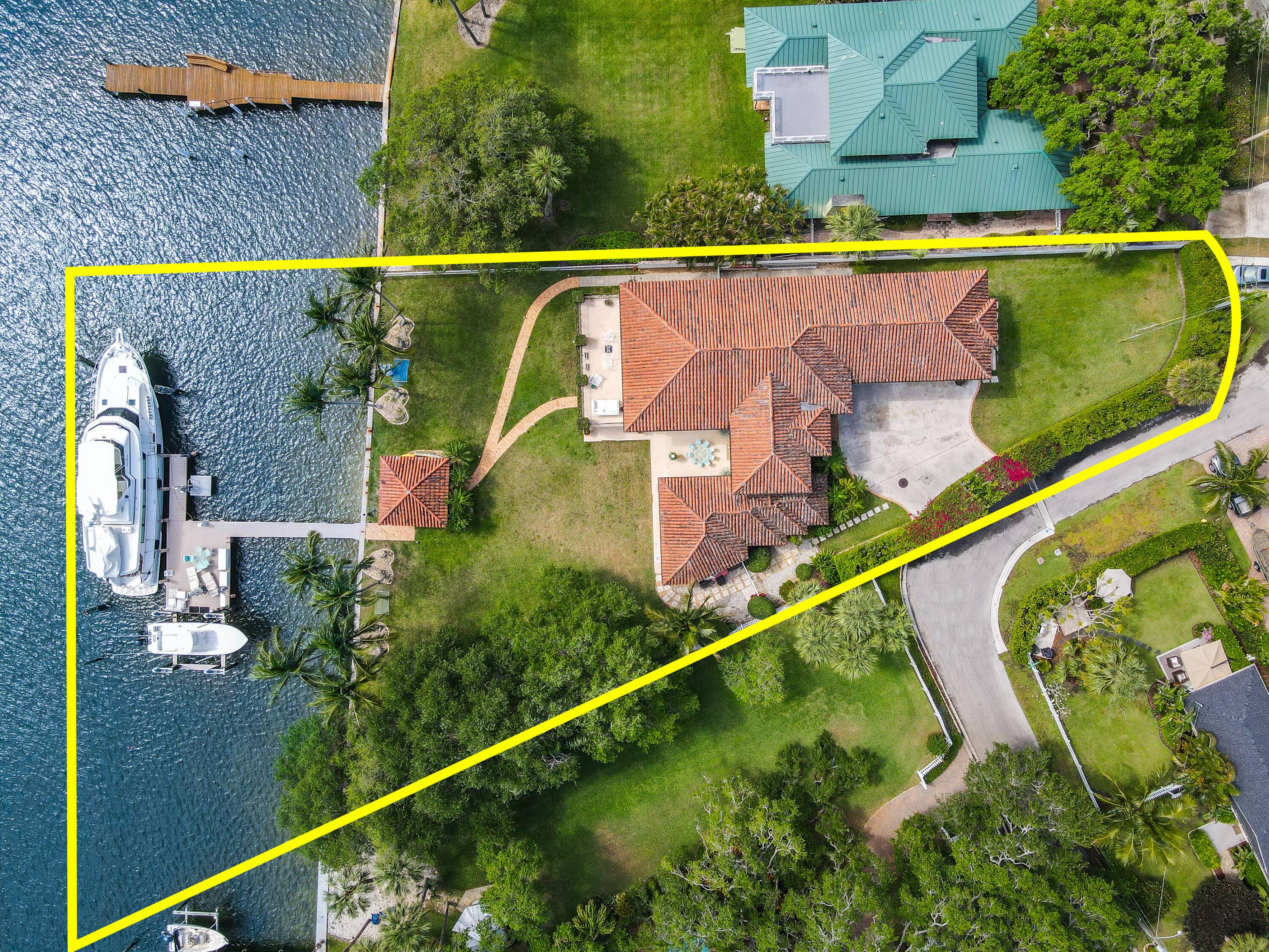 Direct Intracoastal Estate Home with expansive water views in the heart of Palm Beach Gardens.