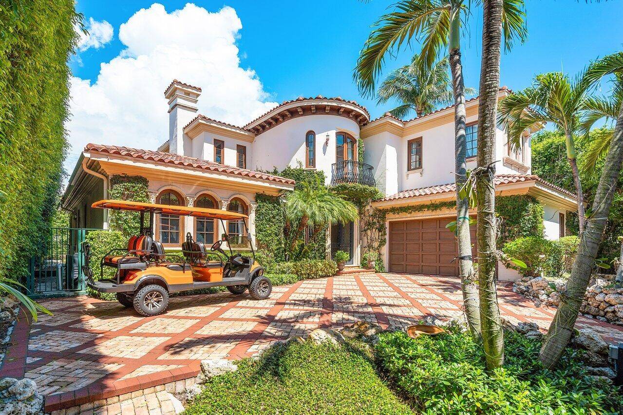 Stunning and with great scale style, this 4 bedroom plus study lake block villa is steps from the heart of Palm Beach's downtown and new Town Marina !