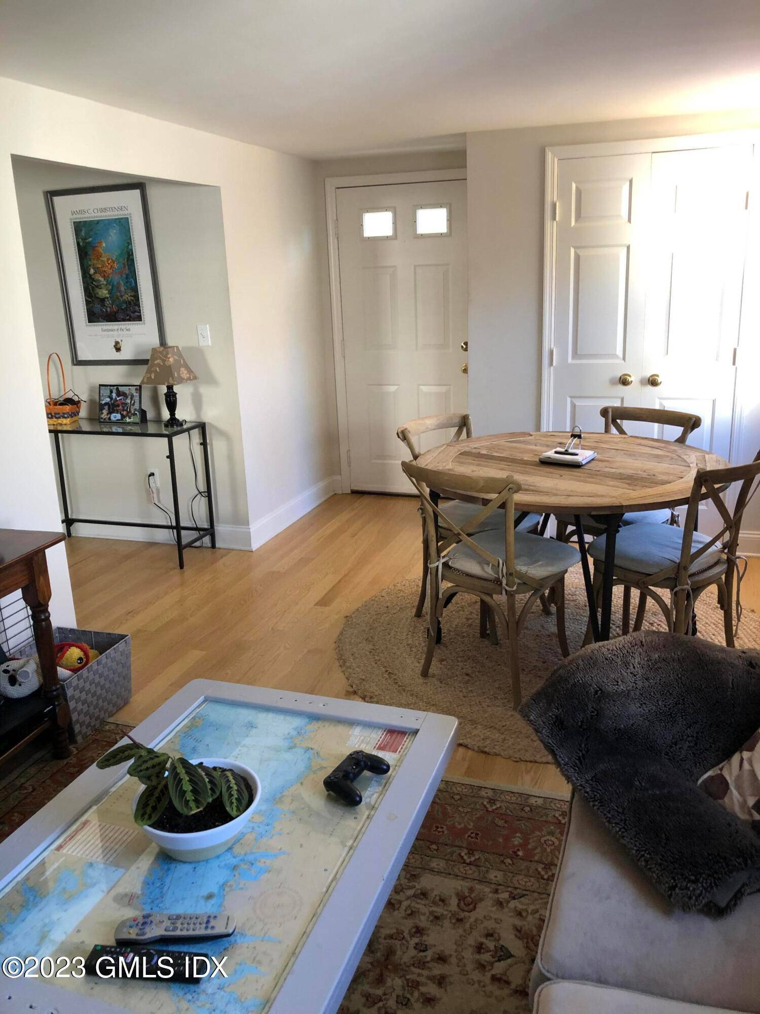 Like New Central Greenwich 2 Bedroom Apartment, Hardwood Floors, Stainless Granite Kitchen, Central HVAC, Laundry in Unit, Storage and Parking.