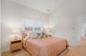 Guest bedroom with vaulted ceilings