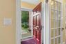 Gracious and welcoming foyer with guest closet