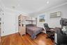 Bedroom featuring crown molding, light wood-style flooring, a desk, and recessed lighting